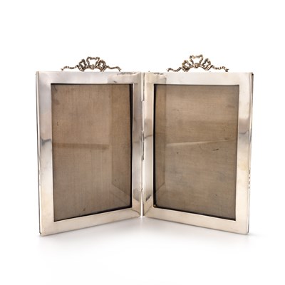 Lot 232 - AN EDWARDIAN SILVER DOUBLE PHOTOGRAPH FRAME