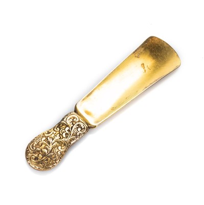 Lot 294 - A VICTORIAN SILVER-GILT SHOE HORN