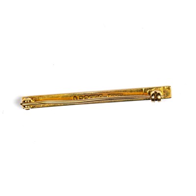Lot 447 - ASPREY: A 9CT GOLD TIE PIN