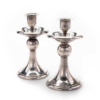 Lot 194 - A PAIR OF WMF SILVER-PLATED CANDLESTICKS