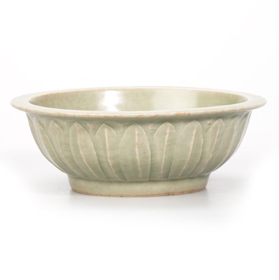 Lot 87 - A CHINESE MOULDED CELADON TWIN-FISH BOWL