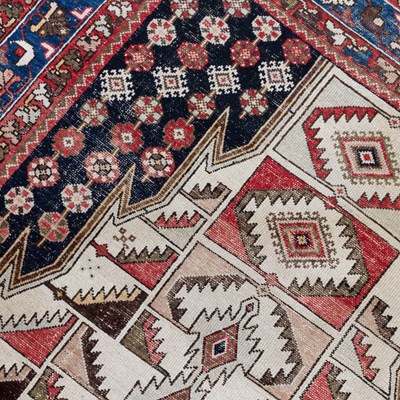 Lot 628 - A NORTH-WEST PERSIAN MAZLAGHAN RUG, CIRCA 1950