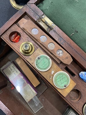 Lot 617 - A VICTORIAN MAHOGANY-CASED BRASS FIELD MICROSCOPE