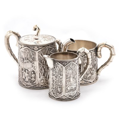 Lot 230 - A CHINESE EXPORT SILVER THREE-PIECE TEA SERVICE