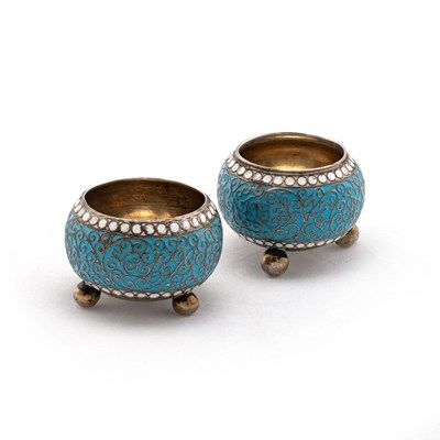 Lot 233 - A PAIR OF RUSSIAN SILVER-GILT AND ENAMEL SALTS