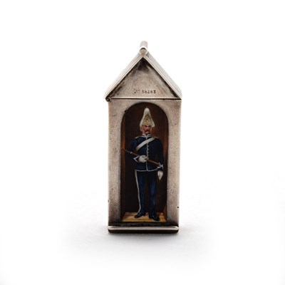 Lot 365 - REGIMENTAL INTEREST: A VICTORIAN SILVER AND ENAMEL NOVELTY VESTA CASE