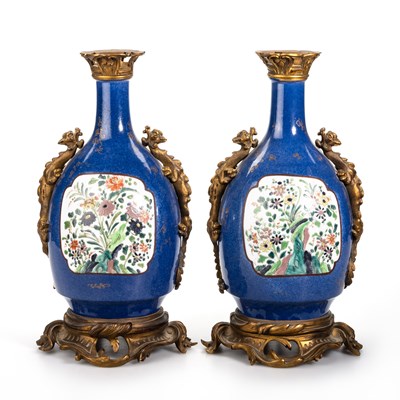 Lot 46 - A PAIR OF ORMOLU-MOUNTED POWDER-BLUE-GROUND AND FAMILLE VERTE BOTTLE VASES