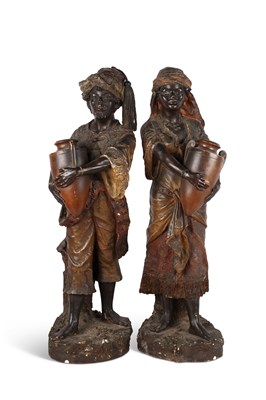 Lot 54 - A LARGE PAIR OF COLD-PAINTED TERRACOTTA FIGURES OF ARAB WATER CARRIERS, PROBABLY GOLDSCHEIDER