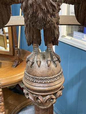 Lot 735 - A LARGE 19TH CENTURY CARVED OAK EAGLE LECTERN