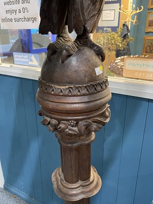 Lot 735 - A LARGE 19TH CENTURY CARVED OAK EAGLE LECTERN