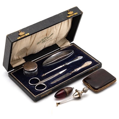 Lot 209 - A GEORGE V SILVER-MOUNTED MANICURE SET