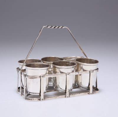 Lot 202 - A SET OF SIX FRENCH IMPORT SILVER TOT CUPS IN A WIRE STAND