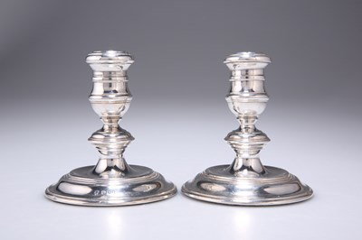 Lot 277 - A PAIR OF ELIZABETH II SILVER CANDLESTICKS