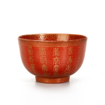 Lot 79 - A CHINESE CORAL RED-GROUND GILT-DECORATED BOWL