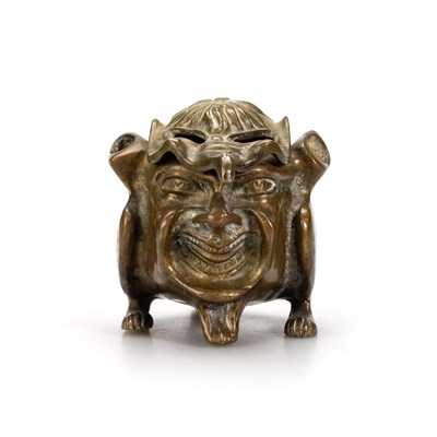 Lot 570 - A BRASS INKWELL IN THE FORM OF A GROTESQUE DEVIL OR IMP, CIRCA 1890-1900