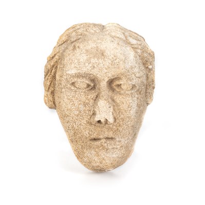 Lot 587 - TWO EARLY CARVED STONE HEADS