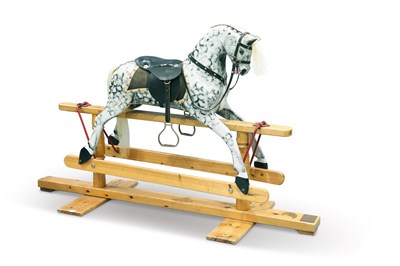 Lot 771 - A 20TH CENTURY CARVED AND PAINTED WOODEN ROCKING HORSE