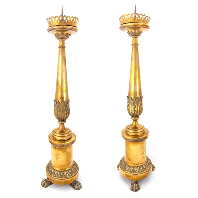 Lot 180 - A LARGE PAIR OF 19TH CENTURY BRASS PRICKET STICKS