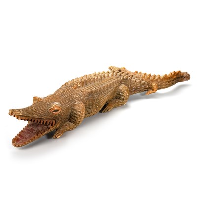 Lot 670 - A LARGE AND UNUSUAL CARVED WOODEN CROCODILE