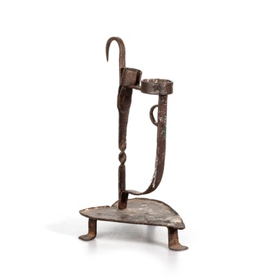 Lot 176 - AN 18TH CENTURY IRON CANDLE HOLDER