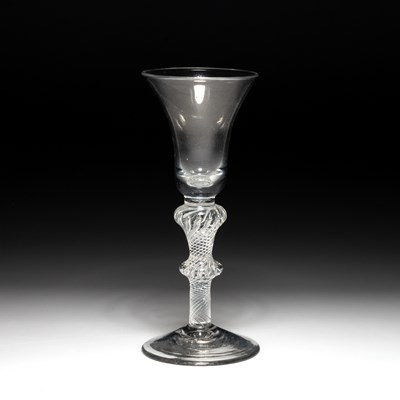 Lot 10 - AN 18TH CENTURY AIR-TWIST WINE GLASS