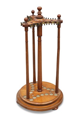 Lot 753 - A LATE 19TH CENTURY OAK REVOLVING SNOOKER CUE STAND