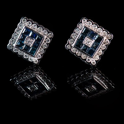 Lot 639 - A PAIR OF 18 CT WHITE GOLD SAPPHIRE AND DIAMOND SQUARE CLUSTER STUD EARRINGS