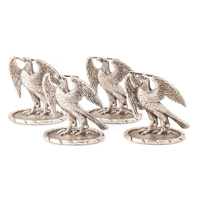 Lot 346 - A SET OF FOUR EDWARDIAN CAST SILVER MENU HOLDERS