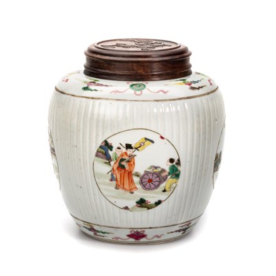 Lot 115 - A CHINESE FAMILLE ROSE FLUTED GINGER JAR AND COVER