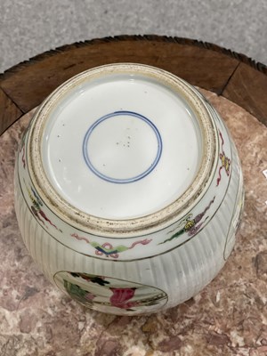 Lot 115 - A CHINESE FAMILLE ROSE FLUTED GINGER JAR AND COVER