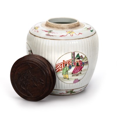 Lot 115 - A CHINESE FAMILLE ROSE FLUTED GINGER JAR AND COVER