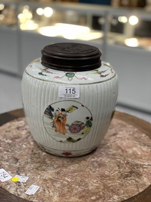 Lot 115 - A CHINESE FAMILLE ROSE FLUTED GINGER JAR AND COVER