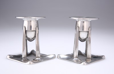 Lot 199 - ARCHIBALD KNOX (1864-1933) FOR LIBERTY & CO, A PAIR OF TUDRIC PEWTER CANDLESTICKS