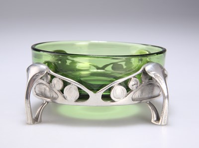 Lot 190 - ARCHIBALD KNOX (1864-1933) FOR LIBERTY & CO, A TUDRIC PEWTER AND GREEN GLASS DISH