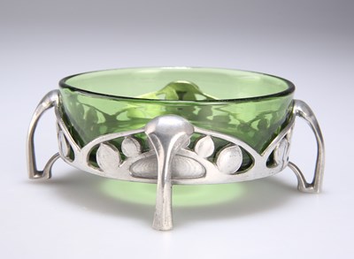 Lot 190 - ARCHIBALD KNOX (1864-1933) FOR LIBERTY & CO, A TUDRIC PEWTER AND GREEN GLASS DISH