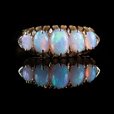 Lot 656 - A VICTORIAN 18 CARAT GOLD OPAL RING