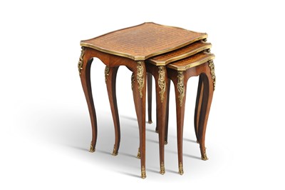 Lot 784 - A SET OF THREE LOUIS XV STYLE GILT-METAL MOUNTED PARQUETRY NESTING TABLES, MID-20TH CENTURY