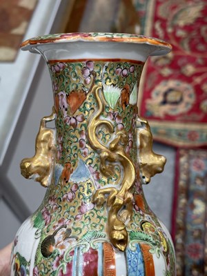 Lot 129 - A PAIR OF CANTONESE FAMILLE ROSE VASES, 19TH CENTURY