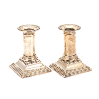 Lot 358 - A PAIR OF GEORGE V SILVER CANDLESTICKS