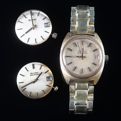 Lot 563 - A GOLD PLATED BULOVA ACCUTRON BRACELET WATCH AND TWO MOVEMENTS