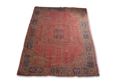 Lot 707 - AN ANTIQUE USHAK CARPET