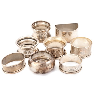 Lot 424 - EIGHT SILVER NAPKIN RINGS