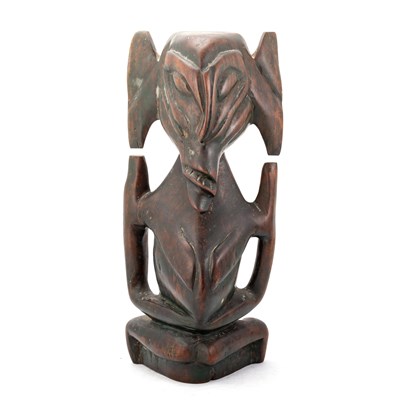 Lot 11 - AN AFRICAN TRIBAL CARVED WOOD STYLISED ELEPHANT