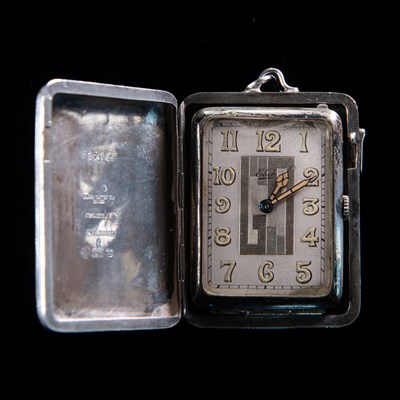 Lot 570 - A CONTINENTAL SILVER EBEL PURSE WATCH WITH CHAIN