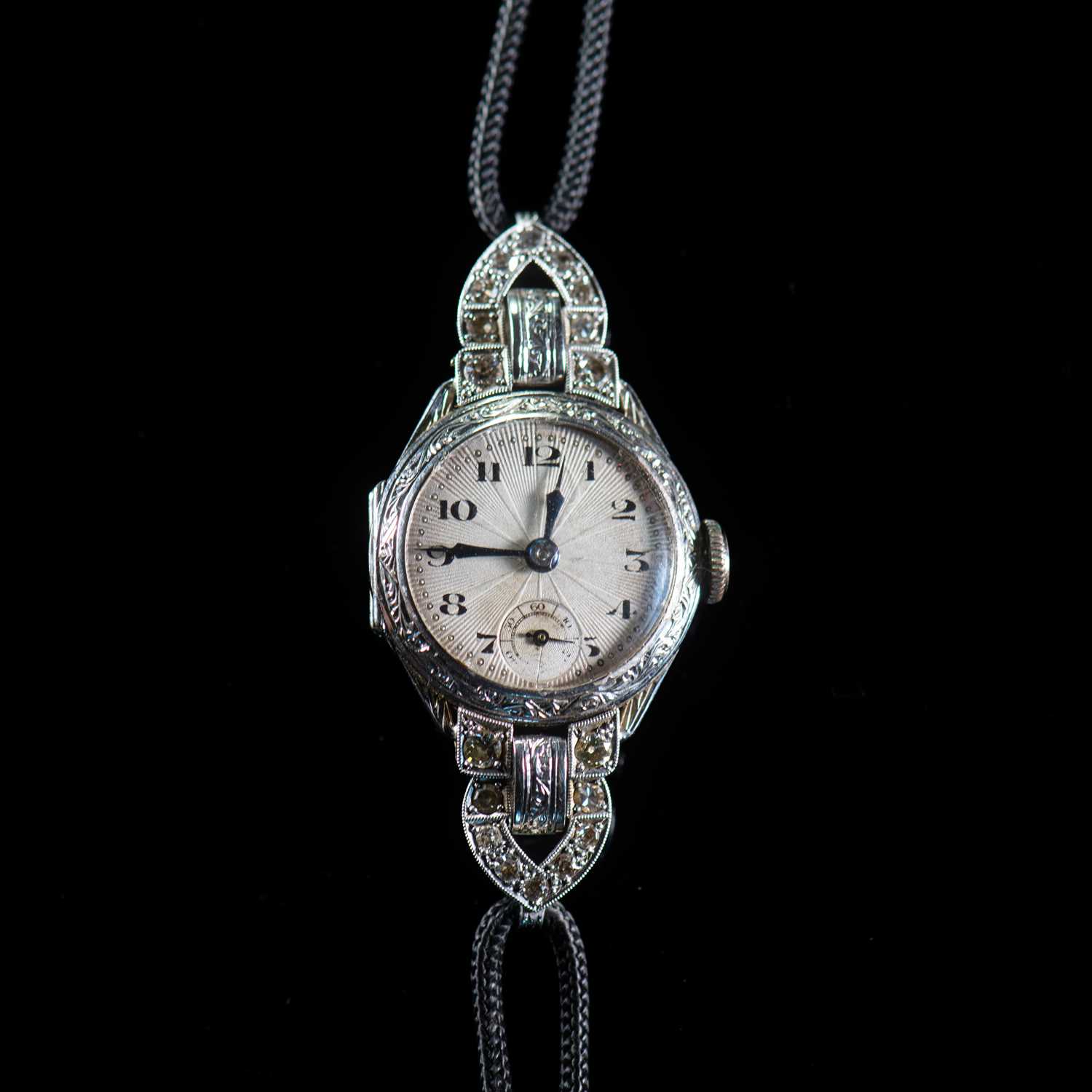 Lot 600 - A LADY'S 18 CARAT GOLD AND DIAMOND SET COCKTAIL WATCH