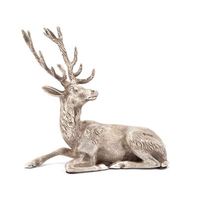 Lot 407 - AN ELIZABETH II CAST SILVER MODEL OF A RECUMBENT STAG