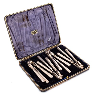 Lot 423 - A SET OF EDWARDIAN SILVER LOBSTER CRACKERS AND PICKS