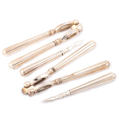 Lot 423 - A SET OF EDWARDIAN SILVER LOBSTER CRACKERS AND PICKS