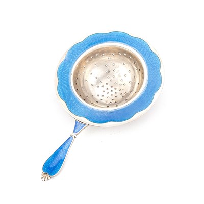 Lot 339 - A NORWEGIAN SILVER AND ENAMEL TEA STRAINER