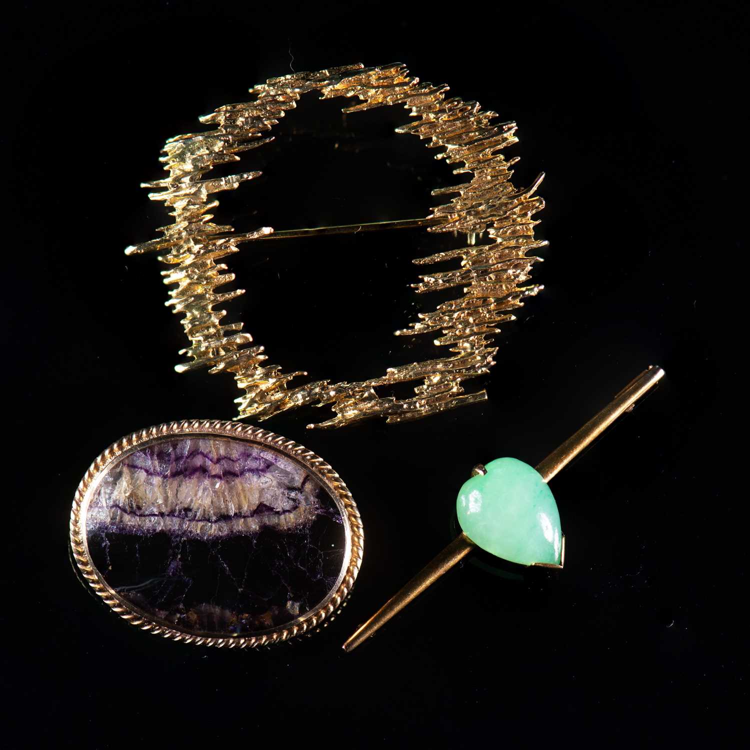 Lot 609 - THREE GOLD BROOCHES